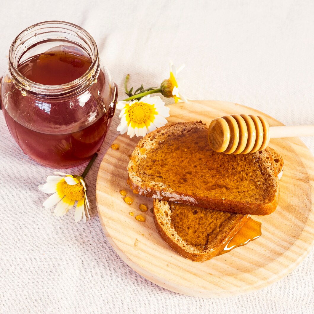 delicious-bread-honey-wooden-plate_23-2148188906.jpg