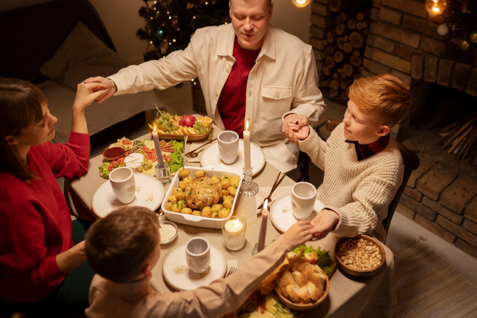 high-angle-family-having-dinner-together_23-2149858319.jpg