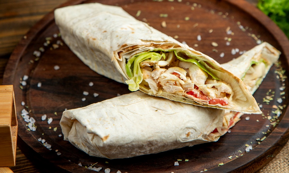 sliced-chicken-wrap-wooden-desk.jpg