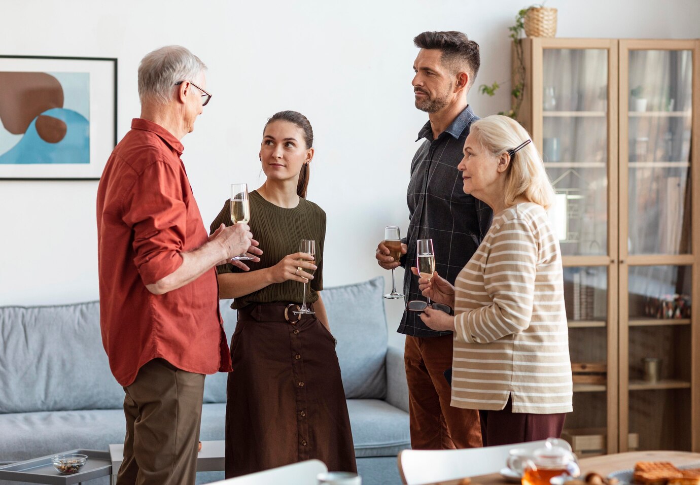 medium-shot-happy-family-holding-glasses_23-2148882067.jpg