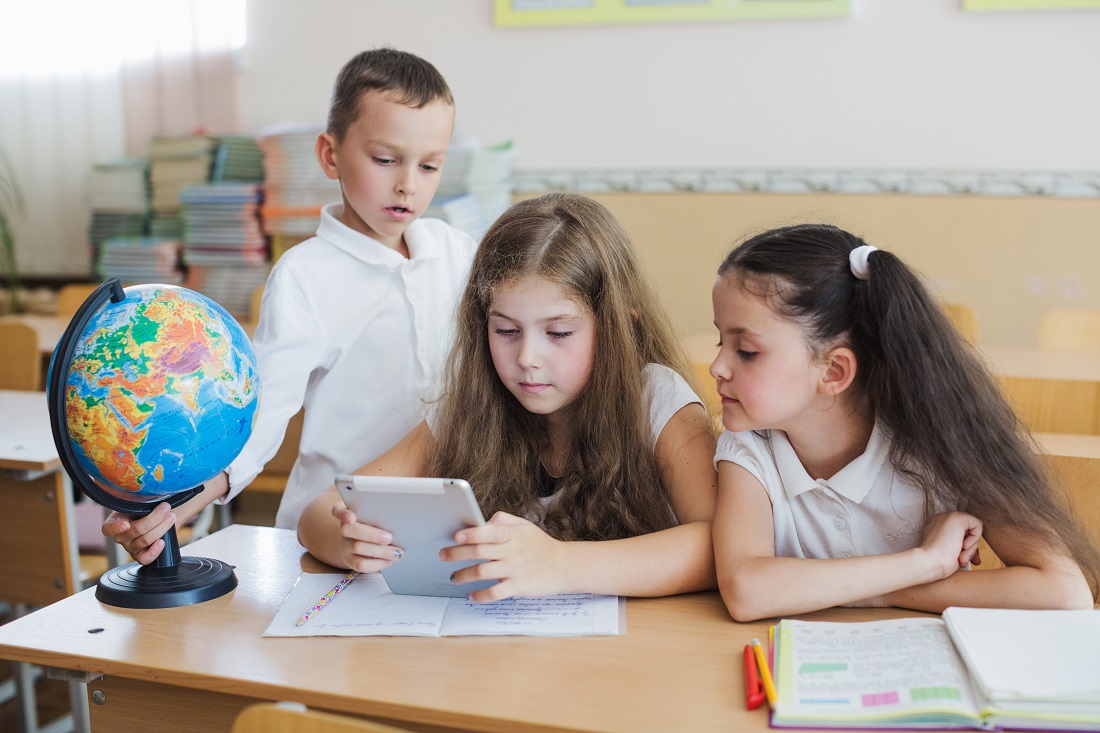 schoolchildren-watching-tablet-with-interest.jpg