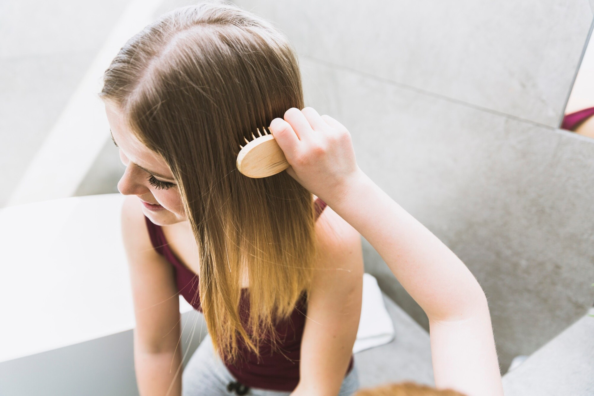 crop-daughter-combing-hair-mother_23-2147807919.jpg